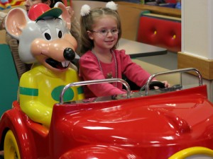 Lauren and Chuck E. Cheese in car